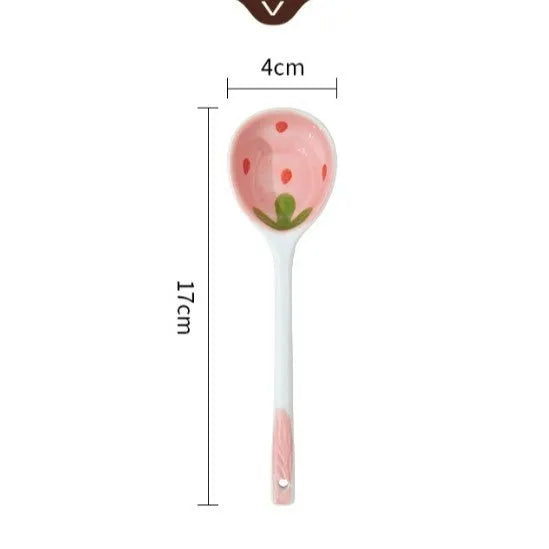 Cute strawberry-themed porcelain dinnerware set with flower bowl, straw hat plate, disc, and twist spoon.