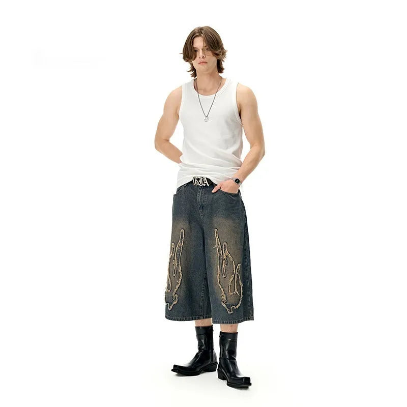 Men's black cropped denim shorts with flame embroidery patch on straight leg summer shorts