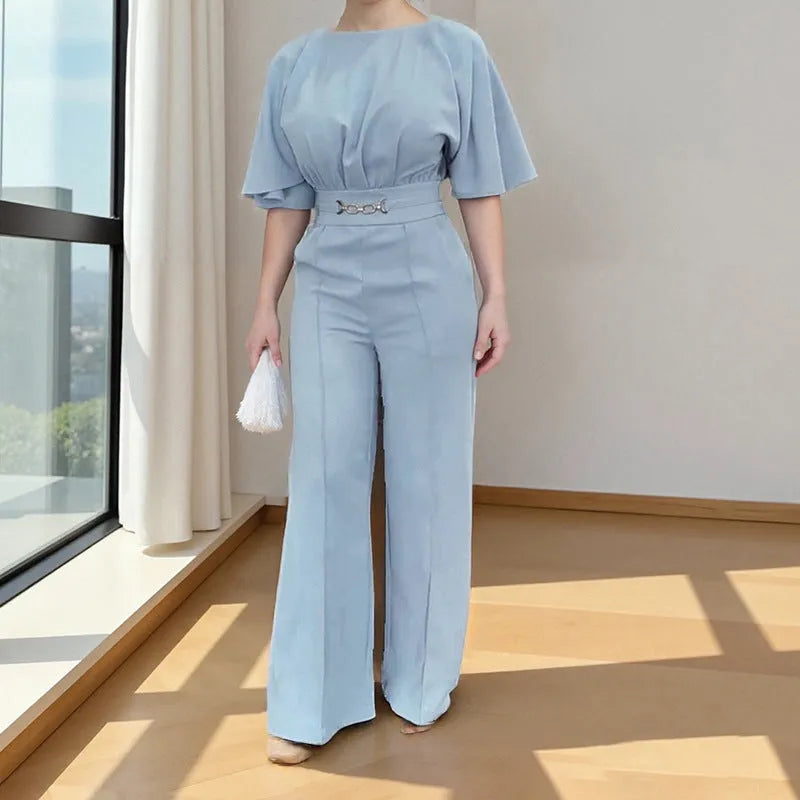 Blue men's two-piece polyester suit with jacket and trousers on a hanger