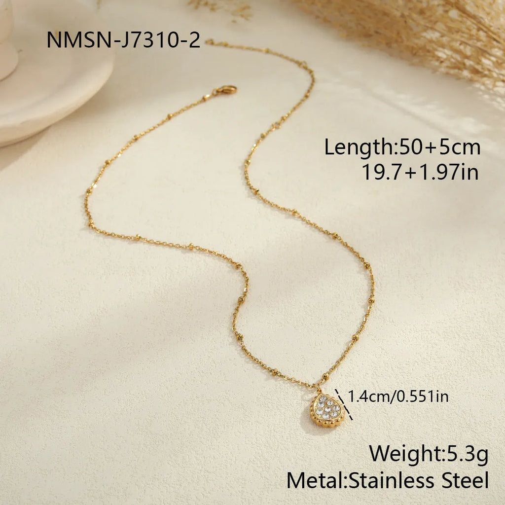 Set of three stainless steel geometric pendant necklaces with 18K electroplating: star, moon, and water drop shapes on regular chains.