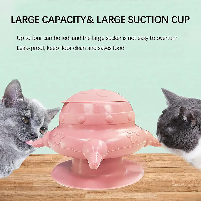 Pink silicone pet nursing bottle with bionic breast design and four pacifiers on a flat base.