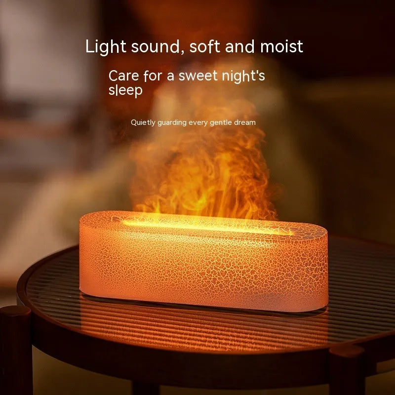 Square black creative lava USB humidifier and aroma diffuser with colourful LED flame lighting on a desk.