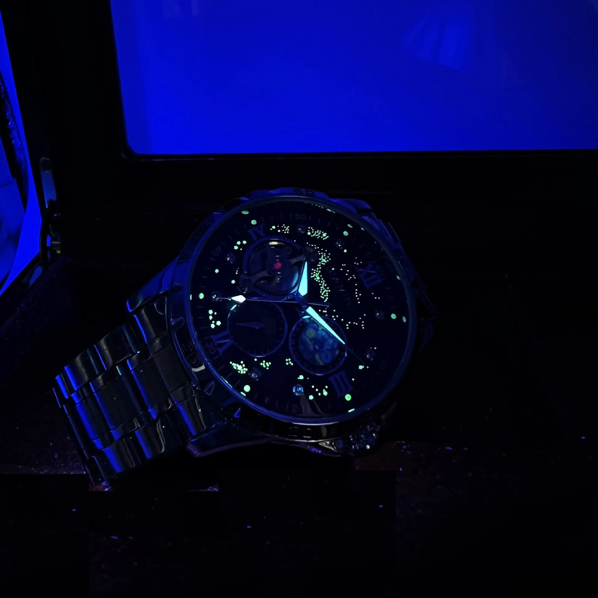 Automatic mechanical men's watch with rose gold shell, black surface, and large multifunctional dial