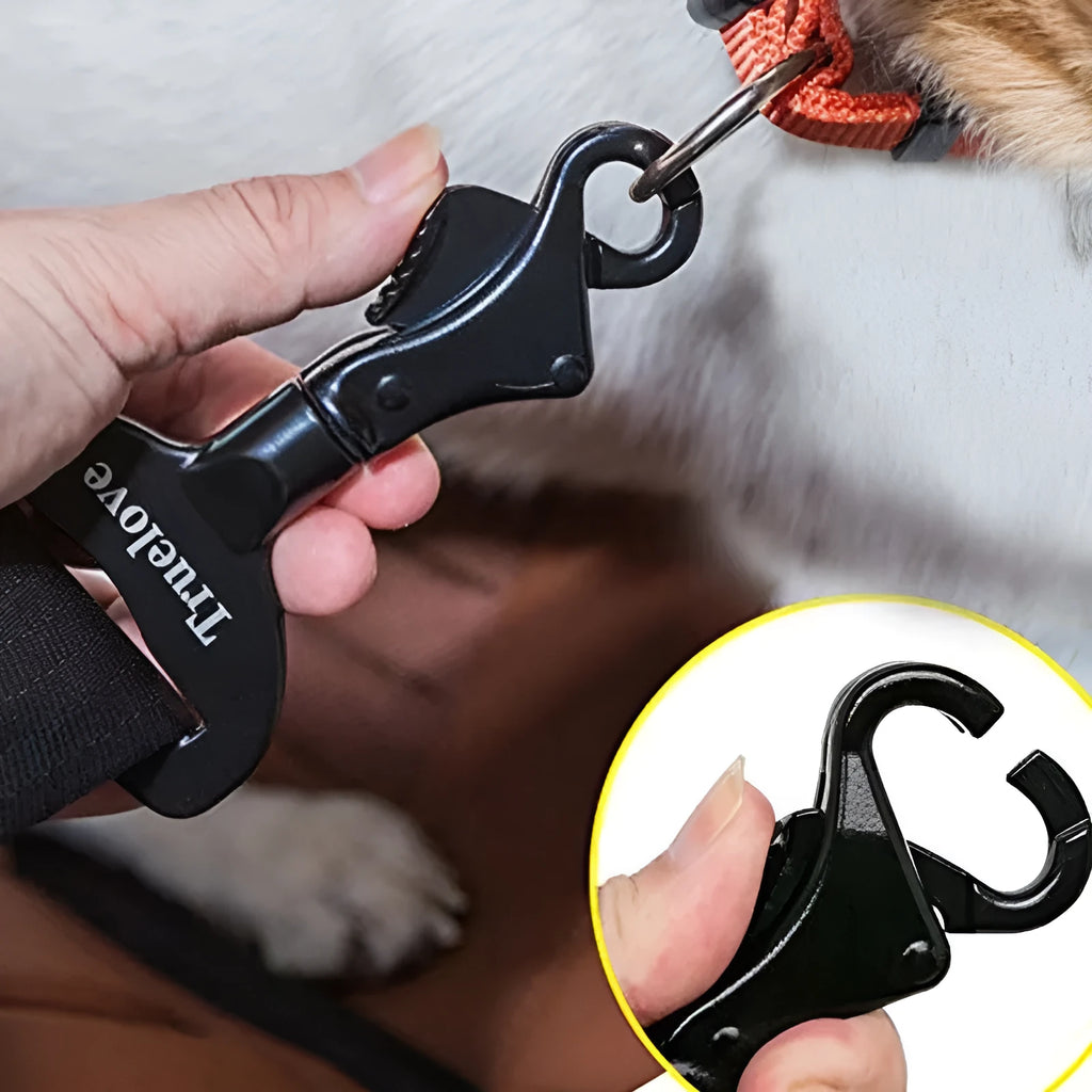 Black aluminium alloy pet car safety buckle with clip on a car seat belt