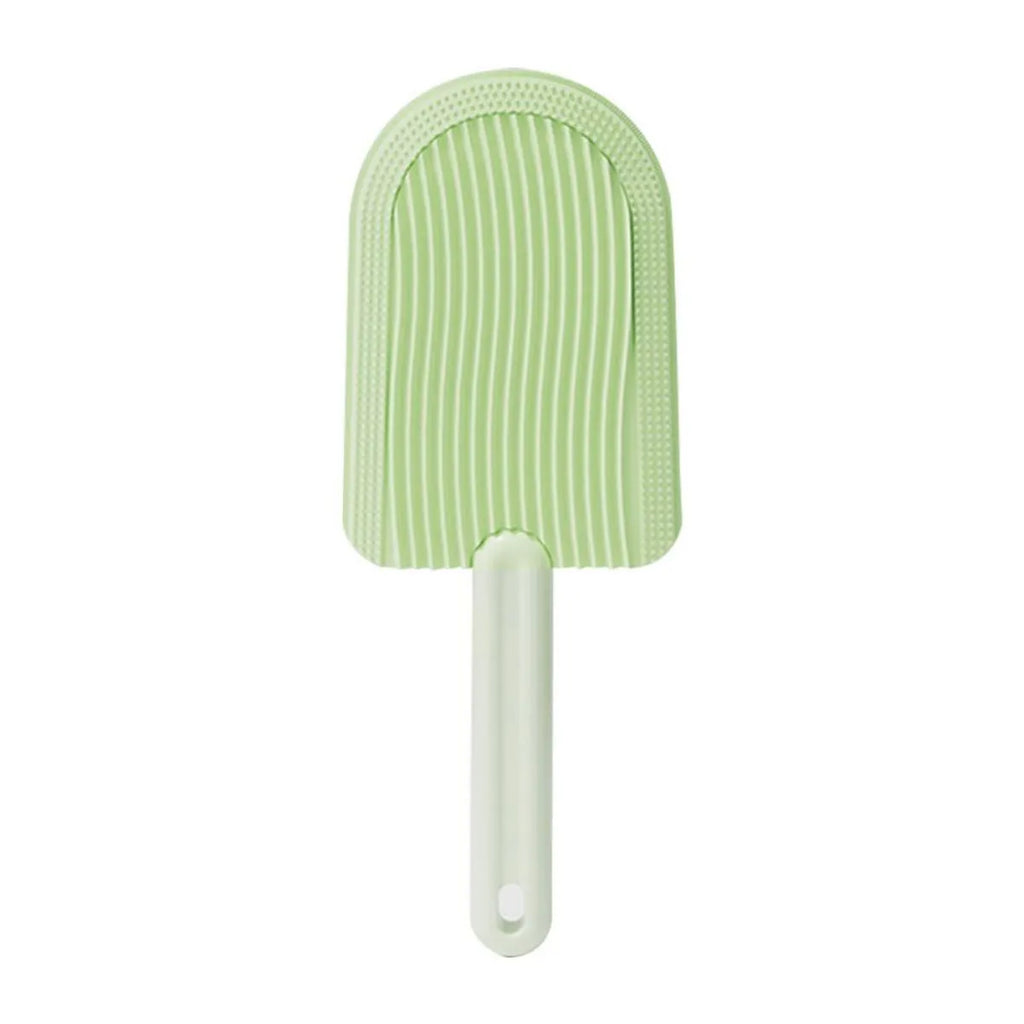 Soft silicone foldable pet hair brush in green, blue and yellow, used for grooming cats and dogs