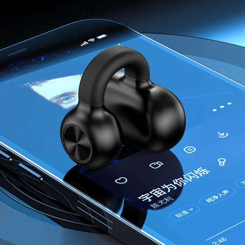 Black wireless clip-on bone conduction Bluetooth earphones with charging cable