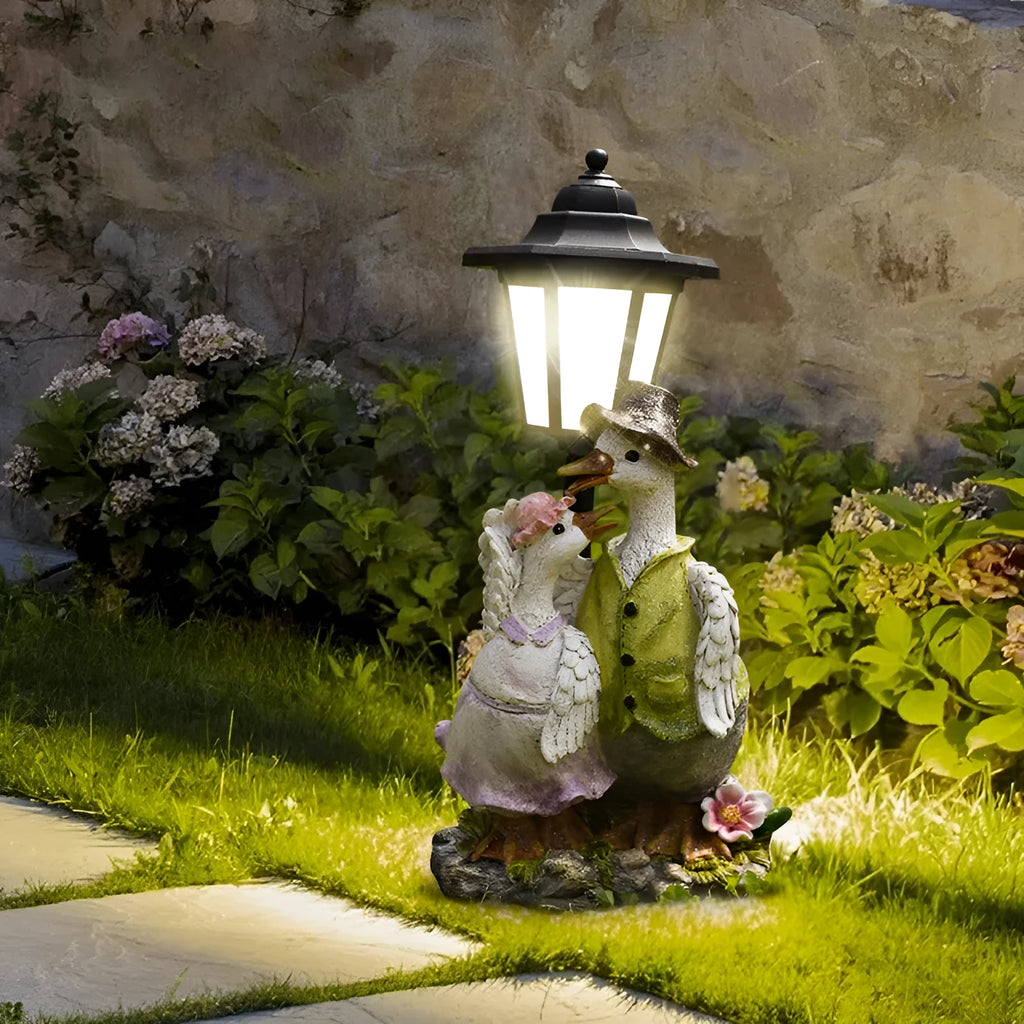 Solar powered resin garden lamp with decorative animal character design for outdoor lighting