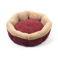 Octagonal velvet pet nest for cats and small dogs with soft cotton velvet lining, shown indoors