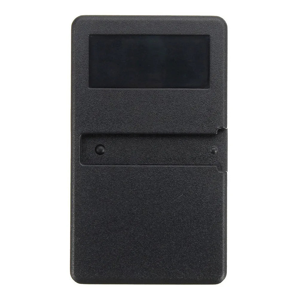 Black plastic three-button LiftMaster garage door remote control with green key, showing front view.