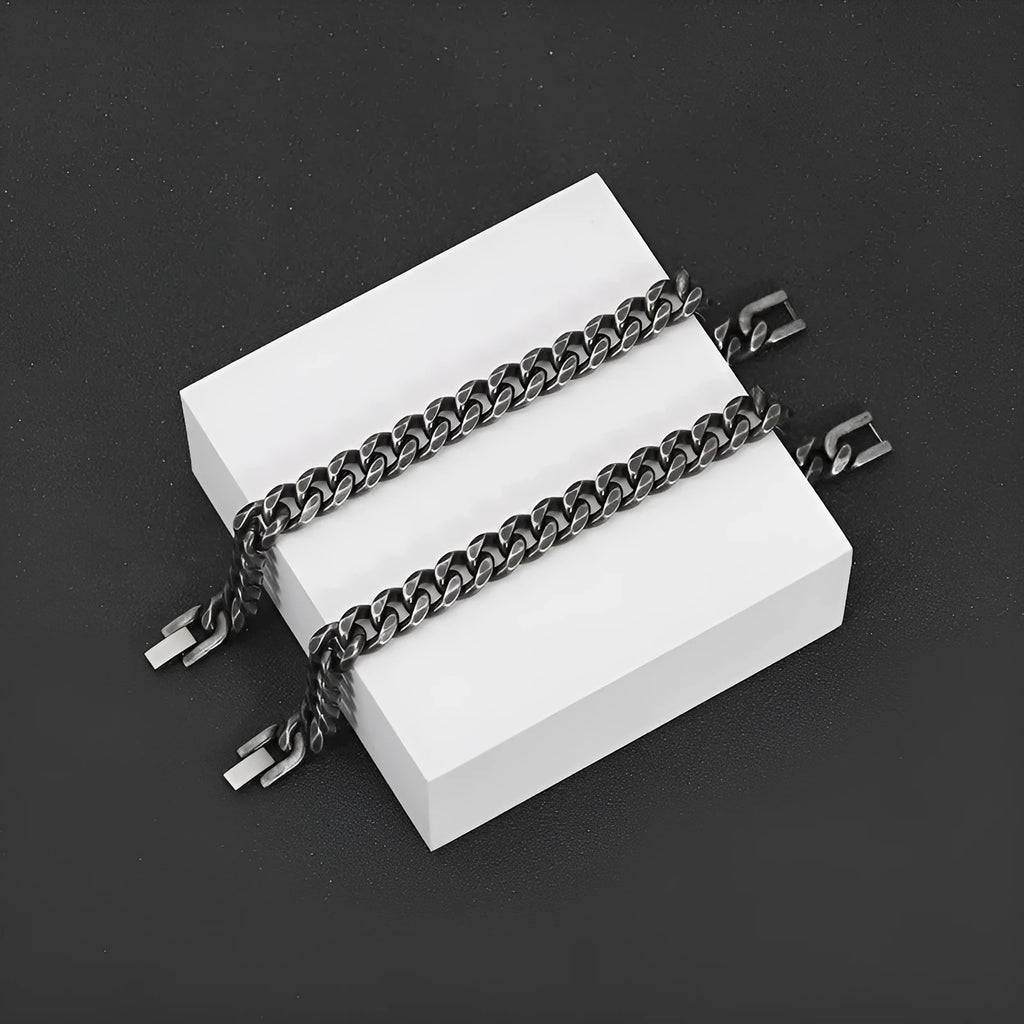 Silver titanium steel geometric bracelet with 10mm width on a neutral background