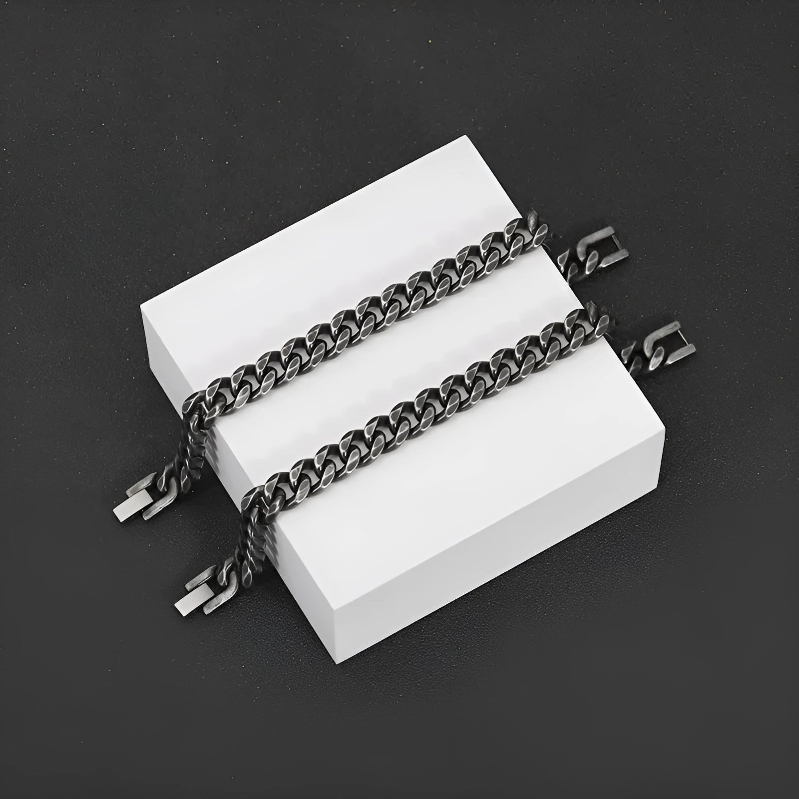 Silver titanium steel geometric bracelet with 10mm width on a neutral background