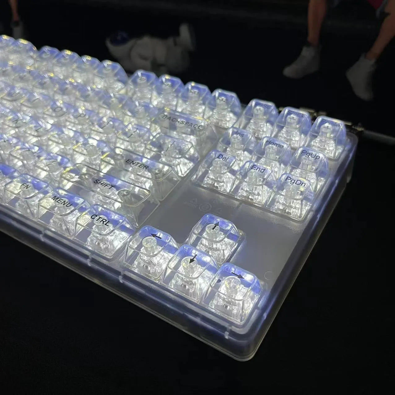 Transparent 132-key mechanical keyboard key cap set showing clear plastic construction