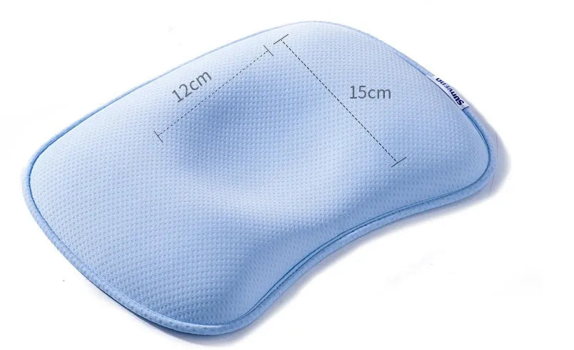 Sunveno baby head shaping pillow in blue with groove shape, corn fibre filling, 31x23cm, on white background