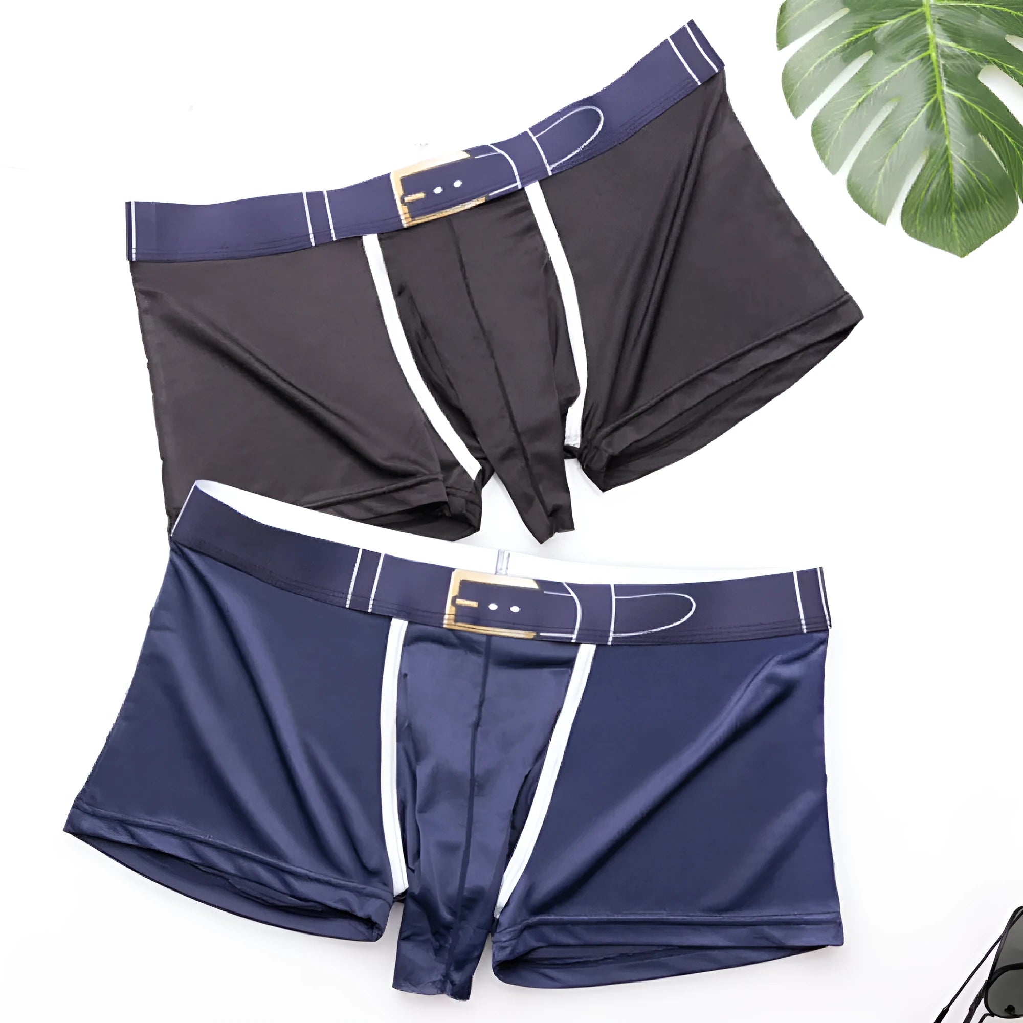 Men's solid colour Ice Silk boxer briefs laid flat, showing mid-waist design and lightweight fabric texture.