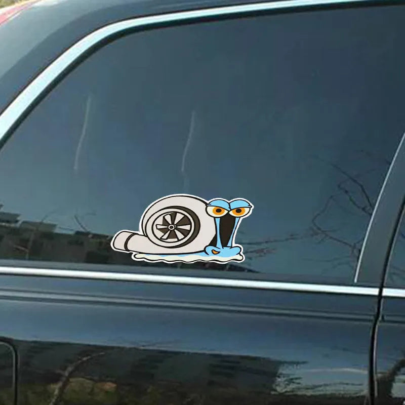 Reflective cartoon snail car bumper sticker measuring 12 by 8 centimetres.