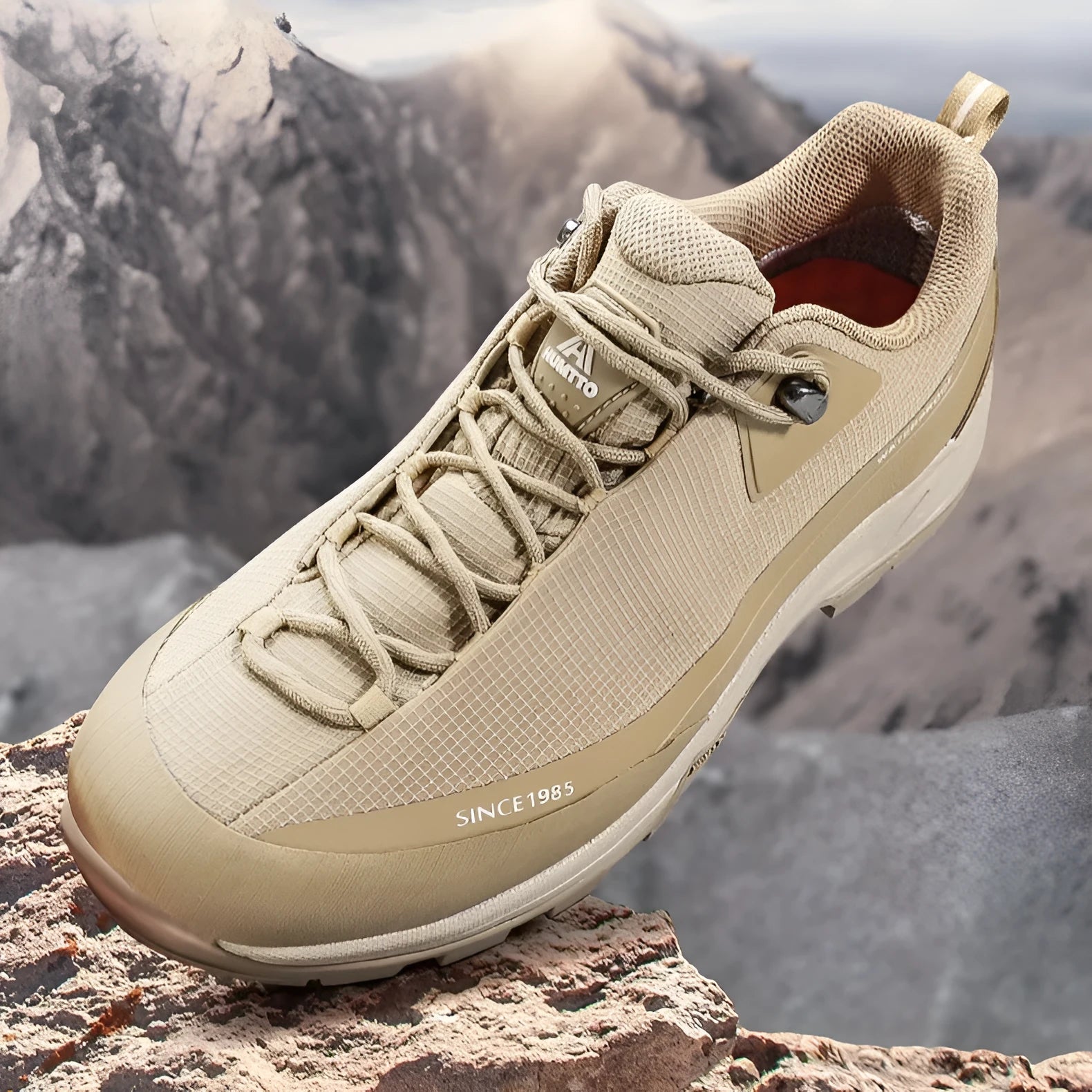 Men's low-top leather mesh hiking boots with front laces and a non-slip rubber outsole