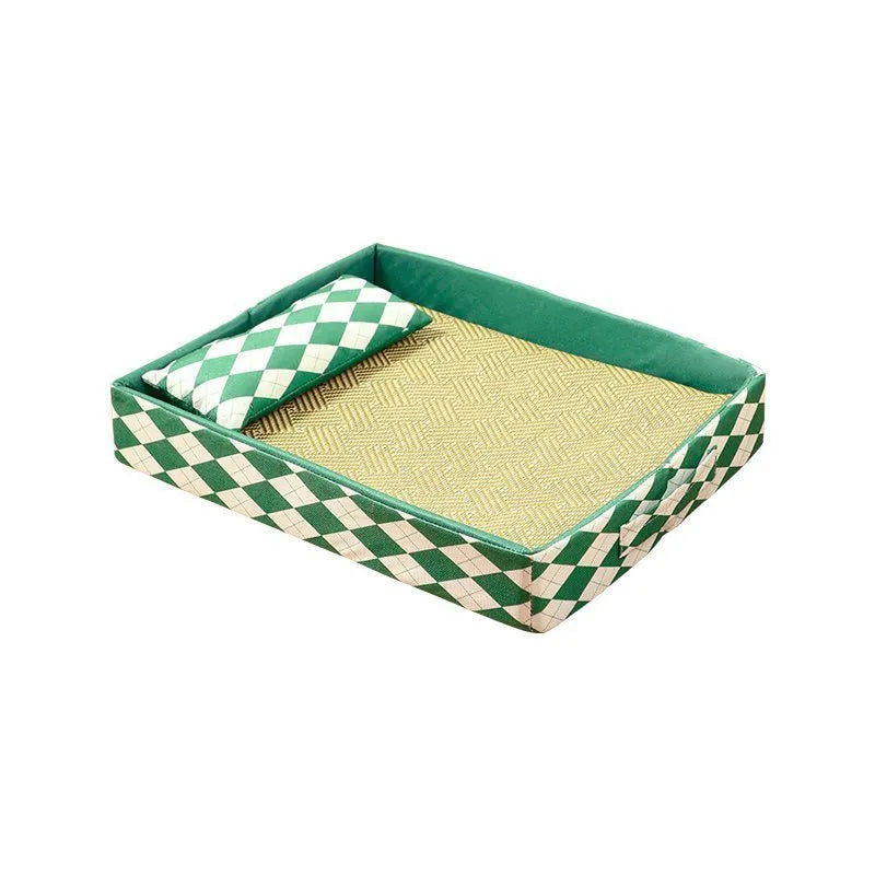 Blue woven rattan cat litter mat and bed in a medium size on a wooden floor.