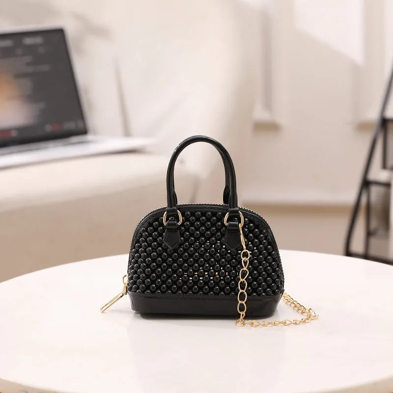 Korean style hollowed-out jelly shell bag in PVC with chain, apricot colour, shell shape, urban design