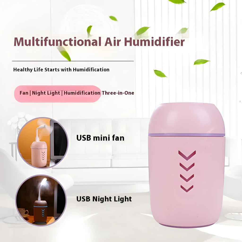 Round white portable air purifier with USB cable on a wooden desk.