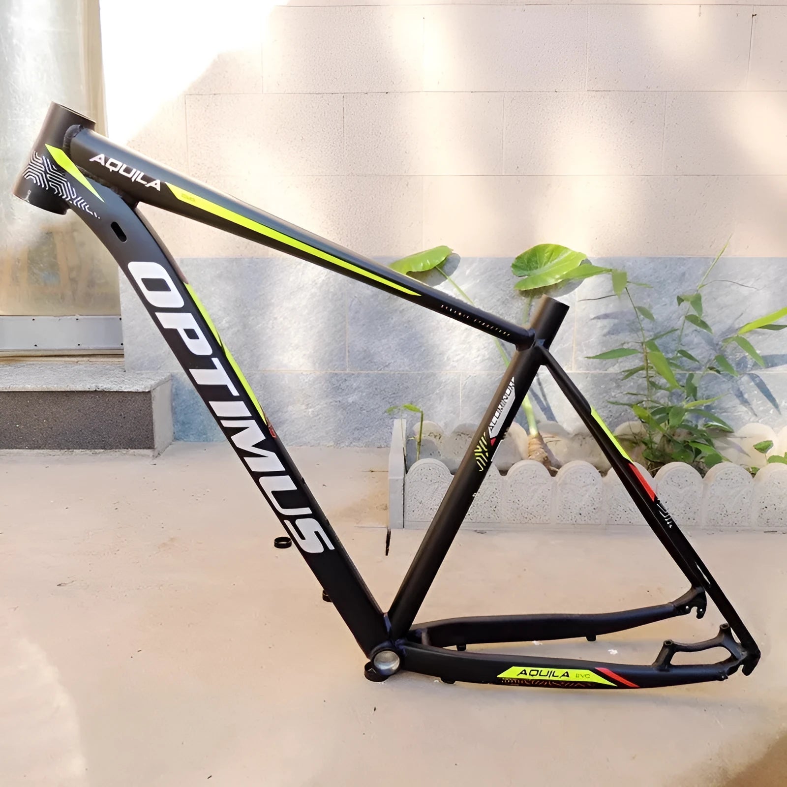 29-inch aluminum mountain bike frame in black green with internal cable routing