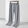 Men's ice silk leisure trousers in loose straight cut with elastic waistband in black colour