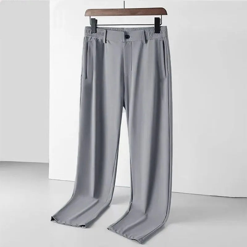 Men's ice silk leisure trousers in loose straight cut with elastic waistband in black colour