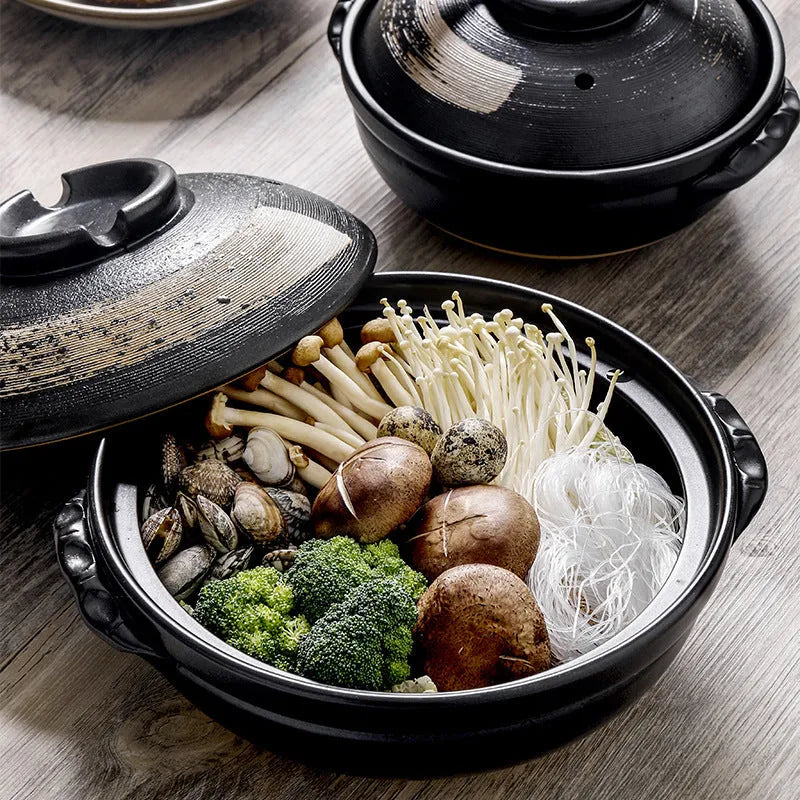 Ceramic casserole pot with lid, 2800ml size, on gas stove, uncoated clay finish