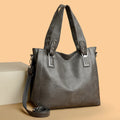 Soft PU women's handbag horizontal square shape with sewing thread detail in five colours black dark gray khaki lake blue yellowish brown