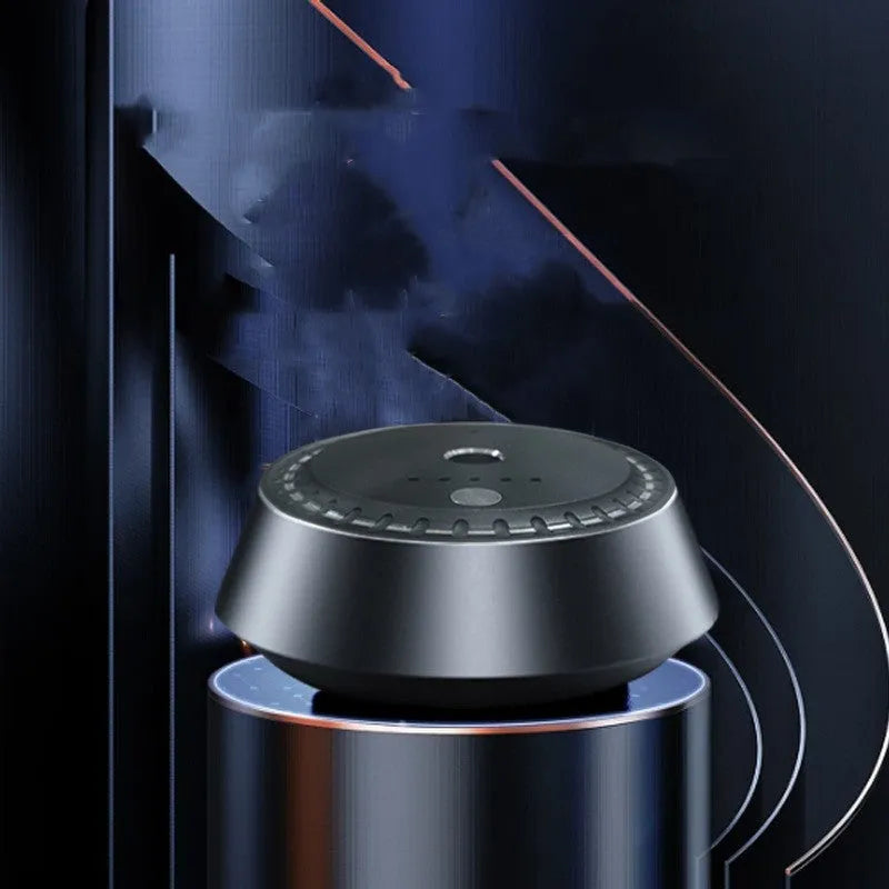 Black metal smart car aroma diffuser with USB cable, showing compact 9cm by 4.5cm size.