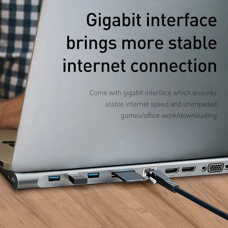 Black and grey aluminium USB-C hub docking station with ten ports and an integrated laptop cooling bracket.