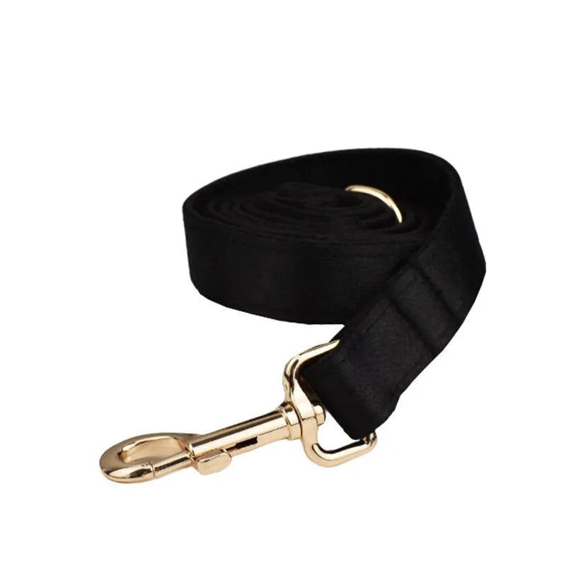 Cloth dog collar and leash set with matching decorative bow and dog vest in various sizes