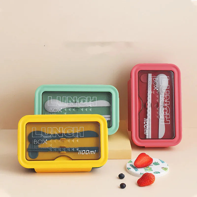 Green Nordic style partitioned lunch box with four food compartments