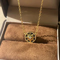 Gold-plated compass necklace for women with round black agate pendant on adjustable curb chain