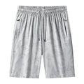 Men's camouflage pattern nylon exercise shorts with knee-length cut and elastic waistband