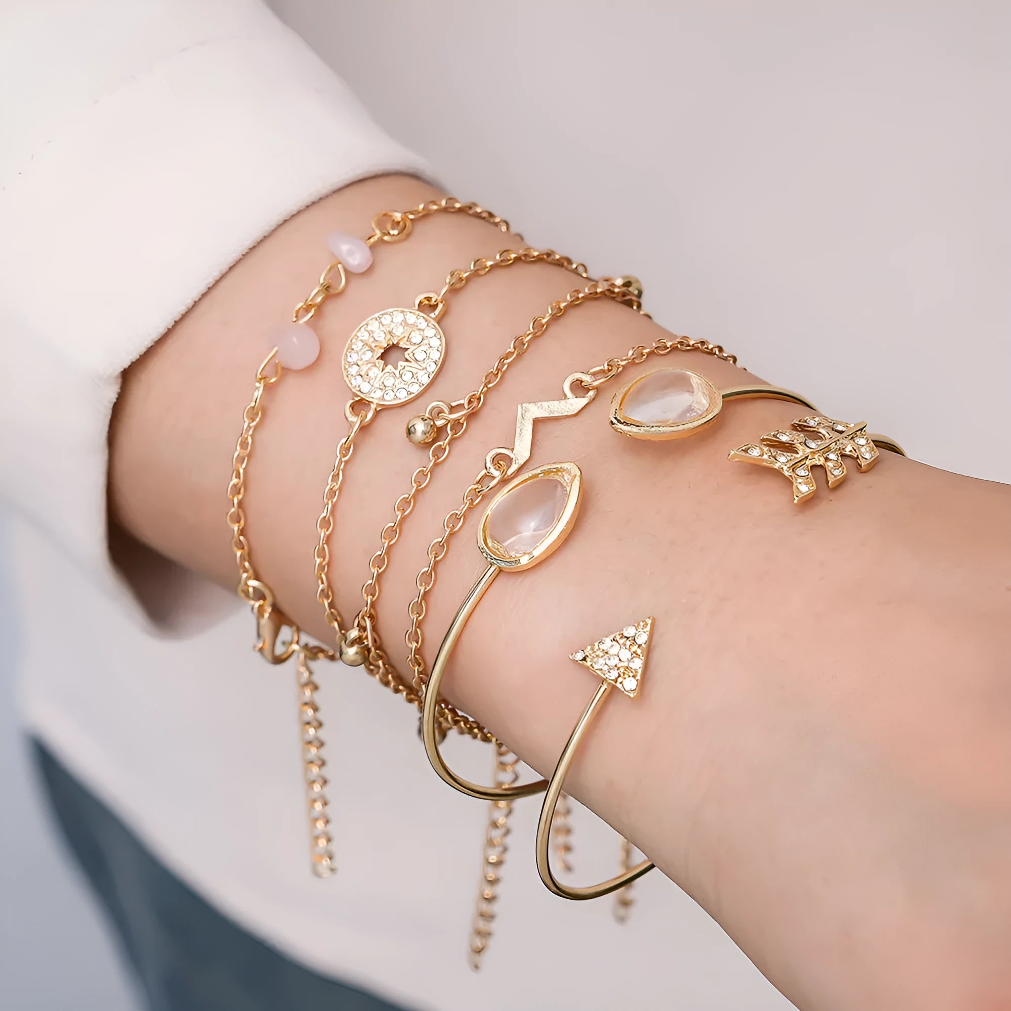 Six-piece women's fashion bracelet set with golden spot drill and water droplet designs