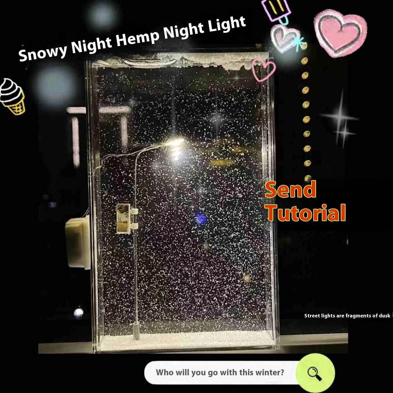 DIY snowy night light kit showing assembled snowflake street lamp scene with warm LED glow on a desktop.