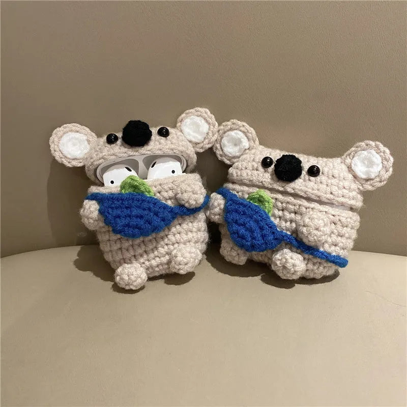 Handmade knitted AirPods protective cover with backpack koala bear design showing front and side views