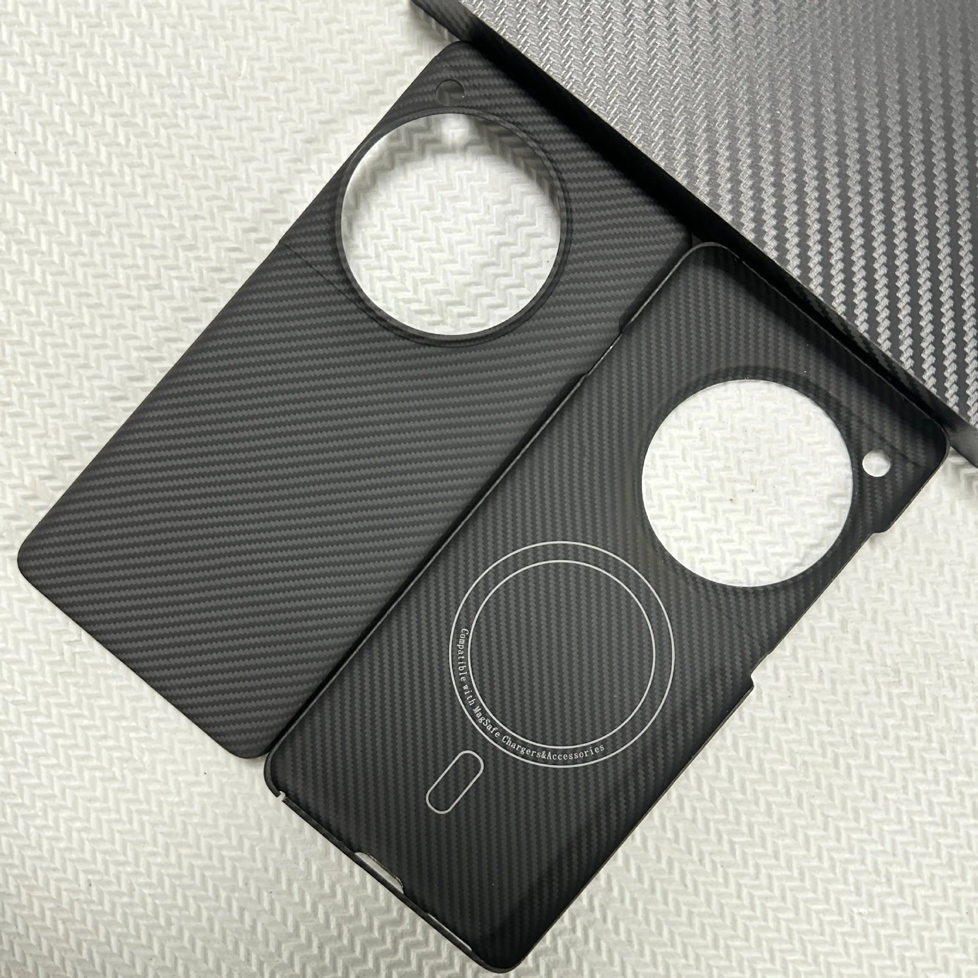 Black hand-woven Kevlar anti-wear phone case for OnePlus 12 with crater texture