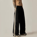 Black men's wide leg climbing trousers with high waist and straight leg design.