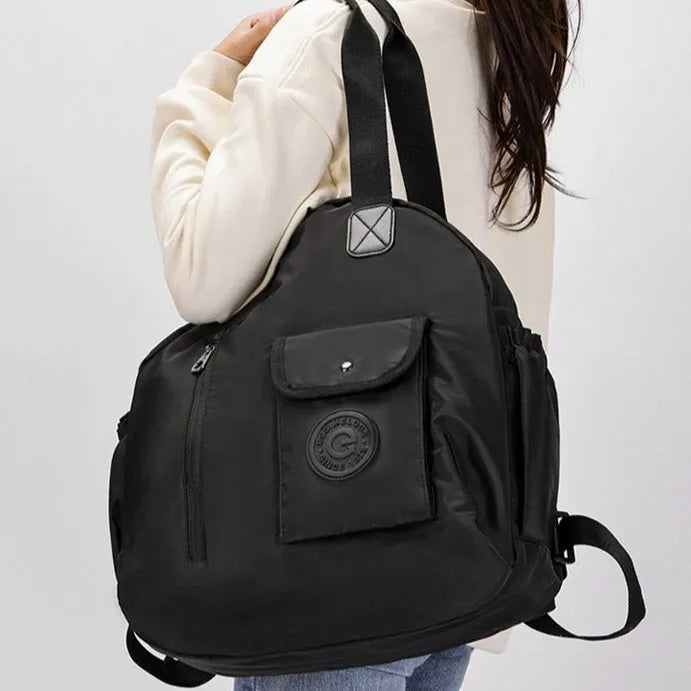 Outdoor backpack with large 48cm height, nylon construction, and sandwich pocket design in three colour options