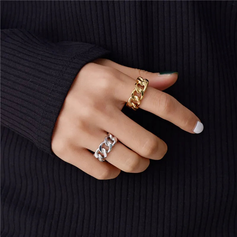 Golden aluminium alloy adjustable geometric ring chain on white background