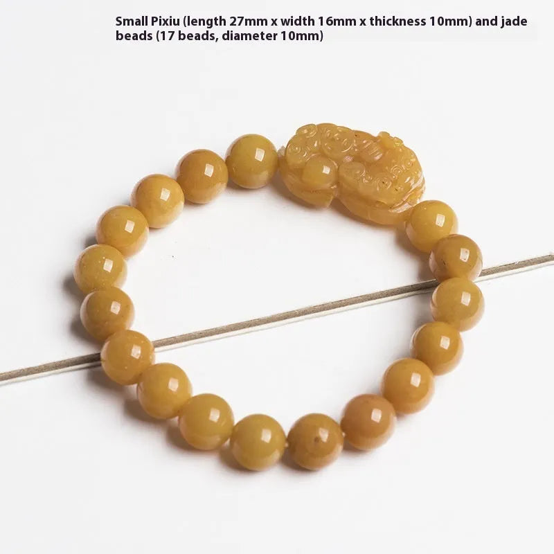 Hand-carved Jinsi Jade money bracelet showing golden thread patterns with jade beads