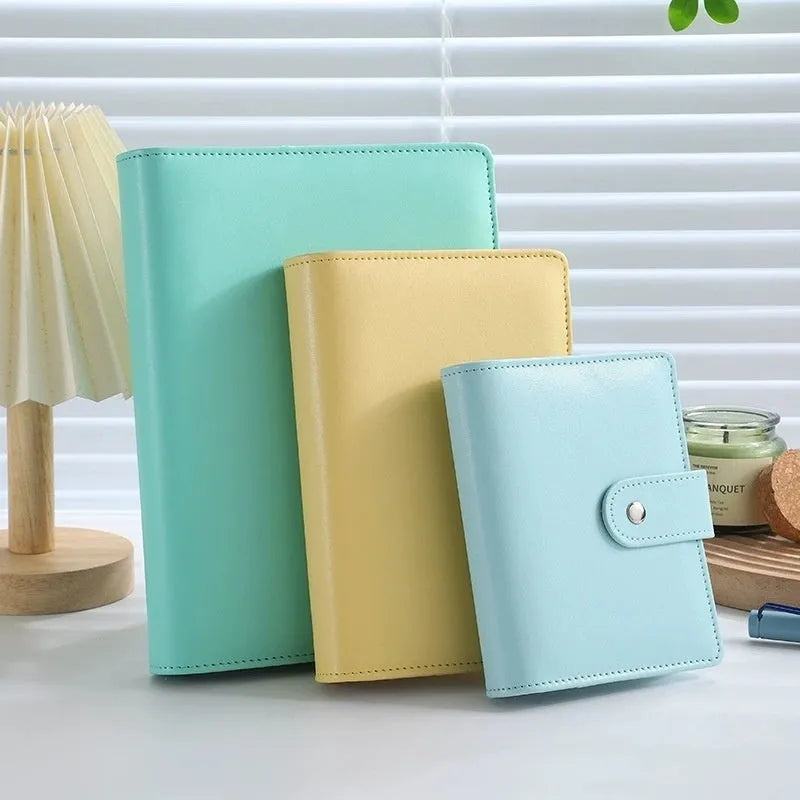 A5 solid colour PU leather notebook binder shell with a zipper, shown in various colours.