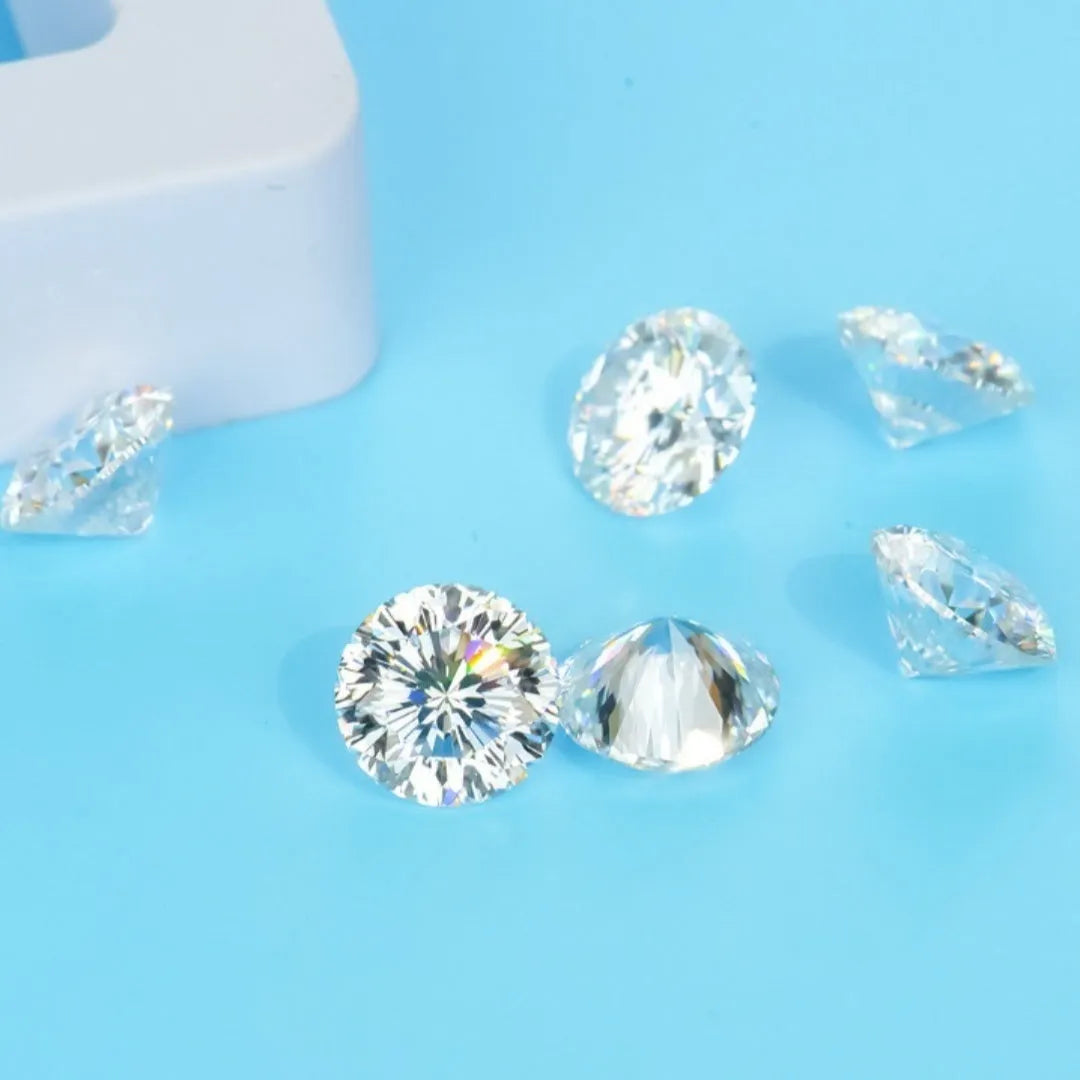 Round moissanite gemstone with eight hearts and eight arrows facet pattern on a white background.