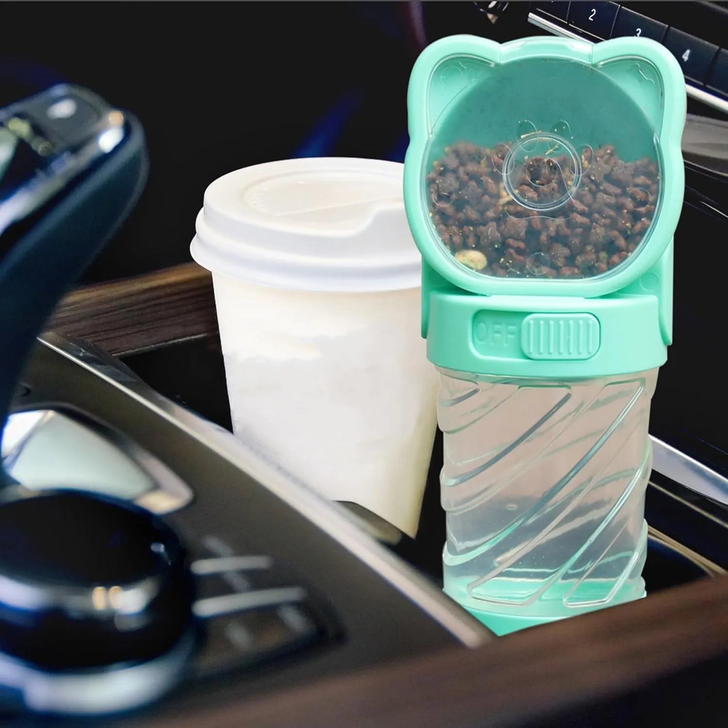 Green 3-in-1 portable pet water bottle with food container and waste bag dispenser for dogs and cats
