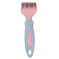 Stainless steel dog comb with knot knife edge and massage nodules, shown in pink colour option
