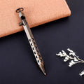 Brass hexagonal retro bolt pen with a 0.5mm tip shown next to a refill.