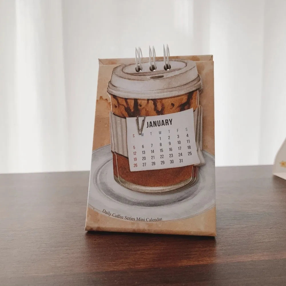 2025 mini desk calendar set showing ten different paper designs including Coffee Time and Life Is Not Easy.