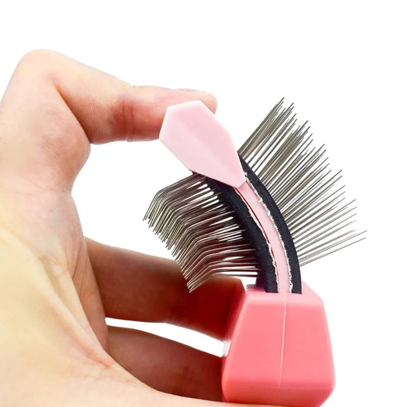 Double-sided pet brush with stainless steel pins in blue colour, showing ergonomic handle and flexible brush head