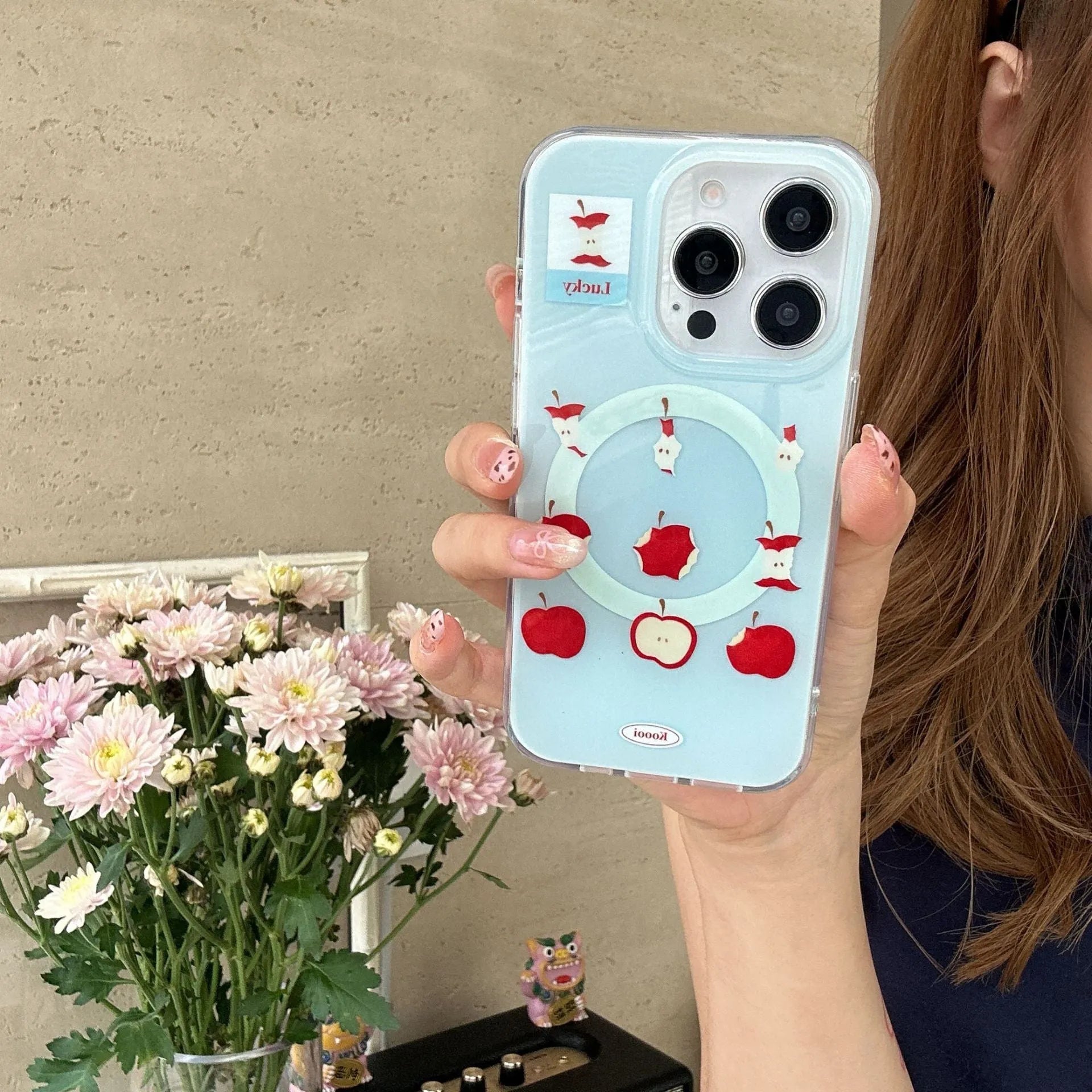 Blue magnetic TPU phone case for iPhone with embossed texture and bracket variant